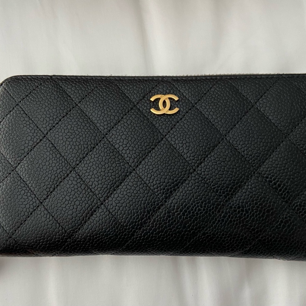 Chanel zip around wallet. Excellent condition. Card and tag included